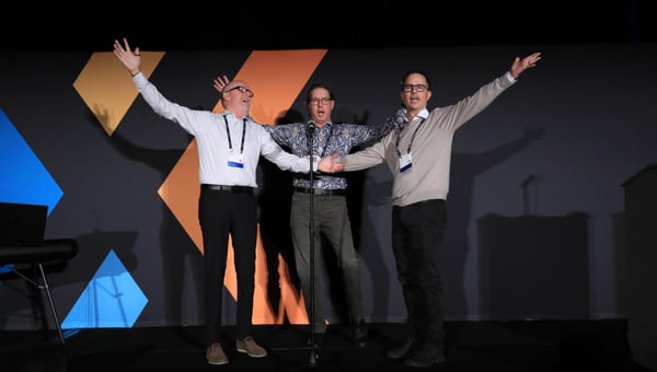 Our Swedish trio sings “When You Wish on CET” to the crowd. From left to right: Peter Brandinger (Managing Director), Johan Lyreborn (Chief Evangelist & Co-Founder), and Stefan Persson (CEO)