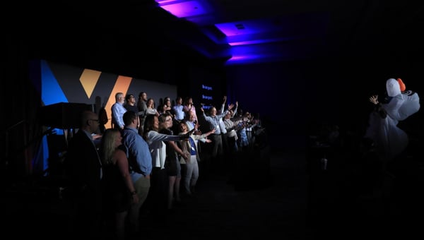 Configurans take to the stage for a version of “Be Our Guest” conducted by Olaf