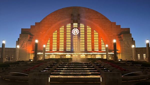  The Art Deco facade of Cincinnati's Union Terminal glowing orange at dusk